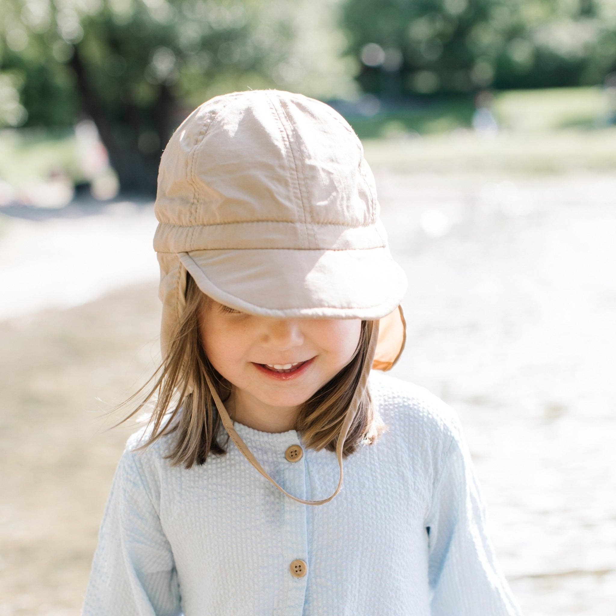 Beige UV-hatt